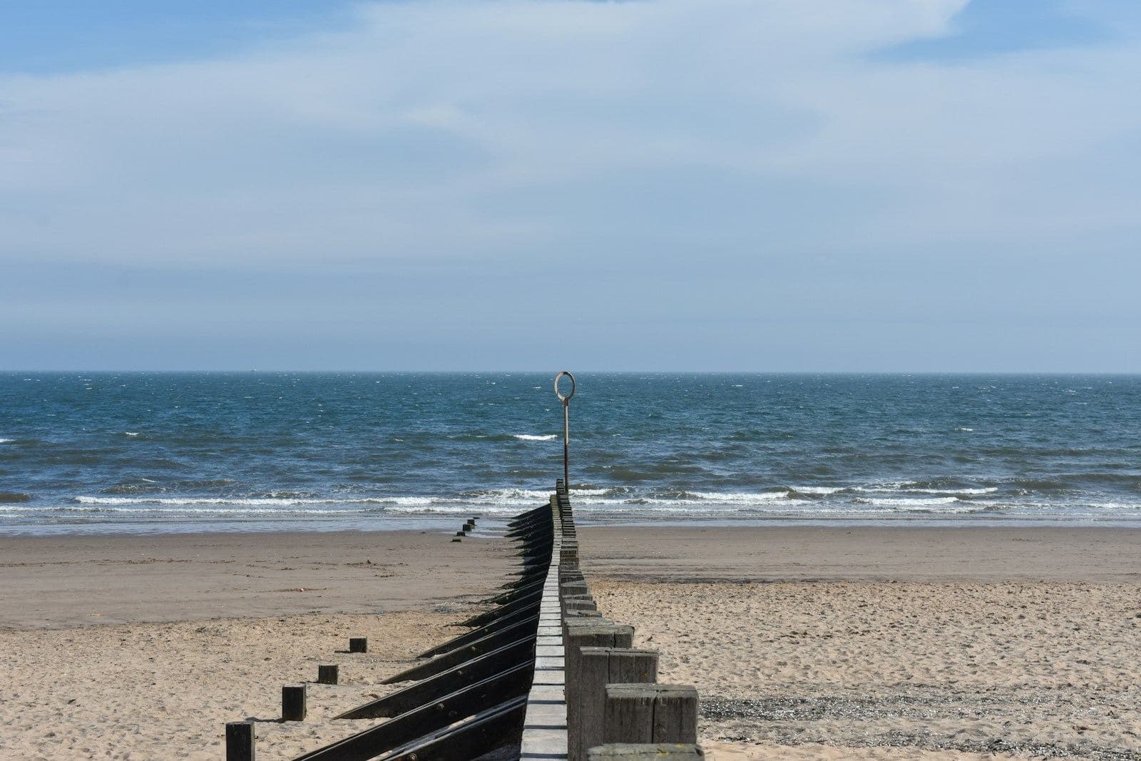 Portobello beach and its wooden groynes on a clear day
