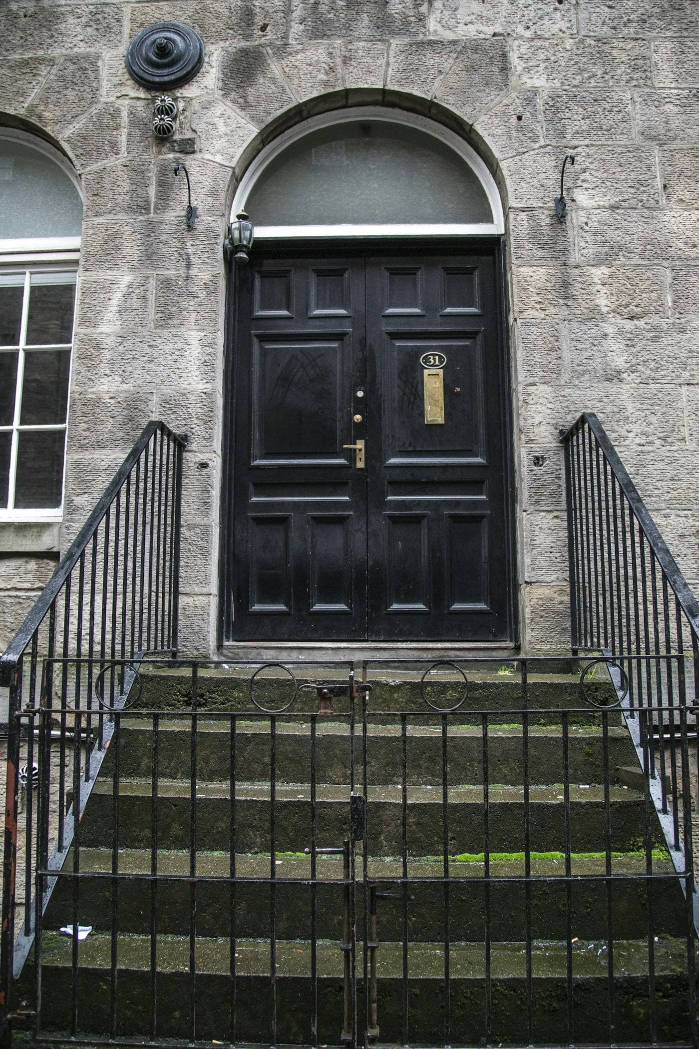 Georgian front door with iron railings in Edinburgh's New Town